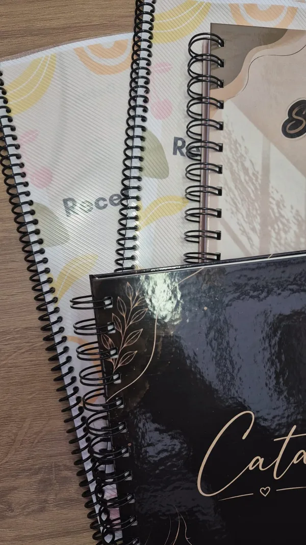 Cuadernos anillados con tapa laminada
